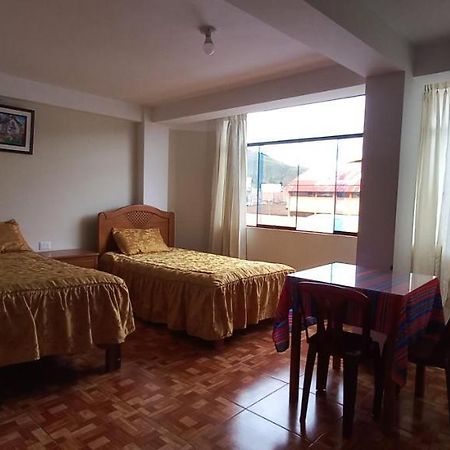 Hospedaje Santa Cruz II Sicuani ภายนอก รูปภาพ