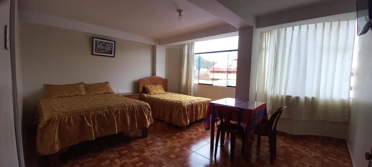 Hospedaje Santa Cruz II Sicuani ภายนอก รูปภาพ