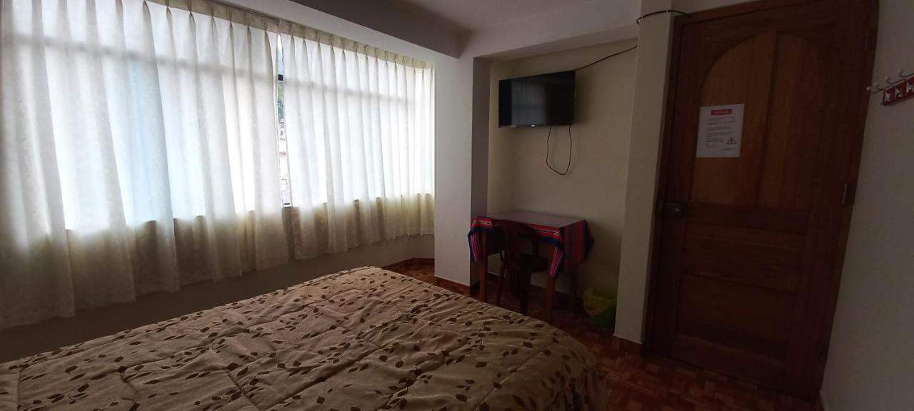 Hospedaje Santa Cruz II Sicuani ภายนอก รูปภาพ